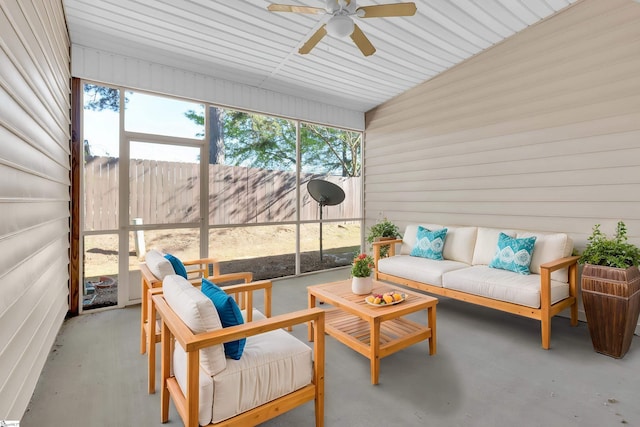 sunroom / solarium with ceiling fan and an outdoor hangout area