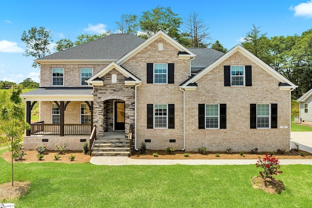 view of front of house featuring brick siding, crawl space, a porch, and a front lawn