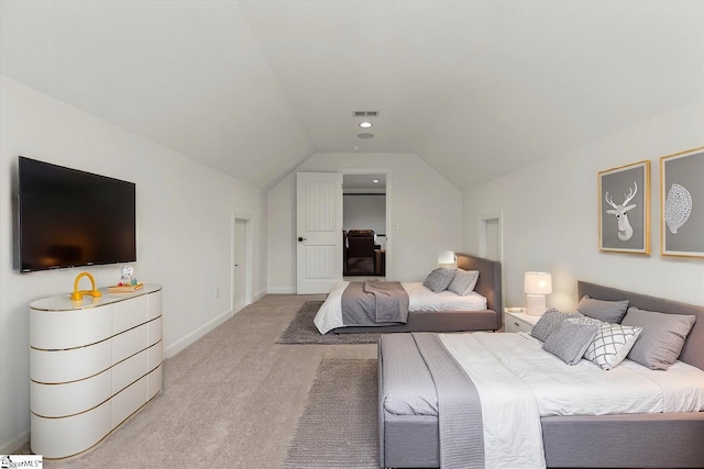 bedroom with visible vents, baseboards, light carpet, and lofted ceiling