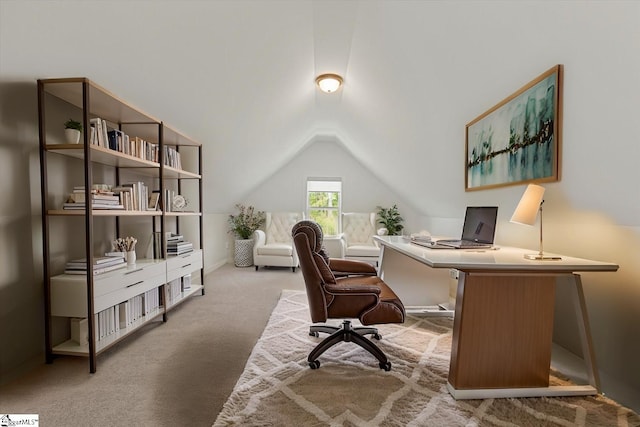office space with carpet floors and lofted ceiling