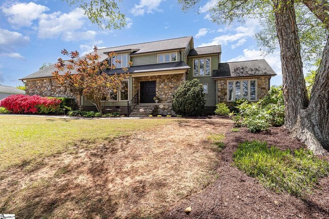 204 Carnoustie Dr, Easley, SC 29642 - view of front of house with stone siding and a front lawn