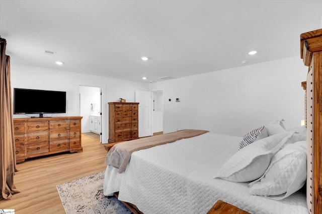 102 Moorish Cir, Simpsonville, SC 29681 - bedroom with recessed lighting, light wood finished floors, visible vents, and connected bathroom