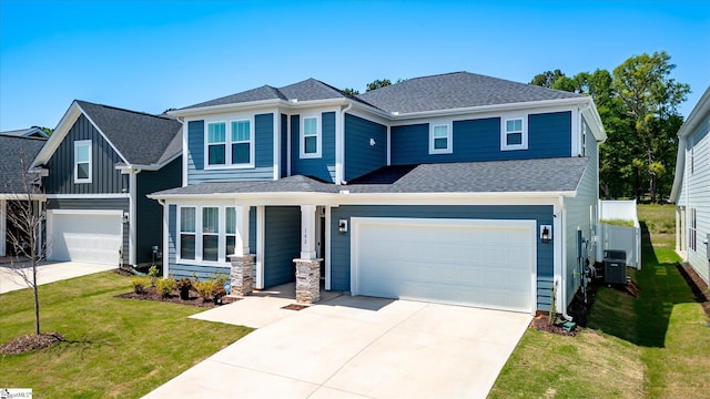 102 Moorish Cir, Simpsonville, SC 29681 - view of front of property with concrete driveway, central air condition unit, a front yard, fence, and a shingled roof