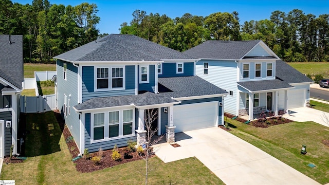 102 Moorish Cir, Simpsonville, SC 29681 - traditional home featuring a shingled roof, driveway, a front lawn, and a gate