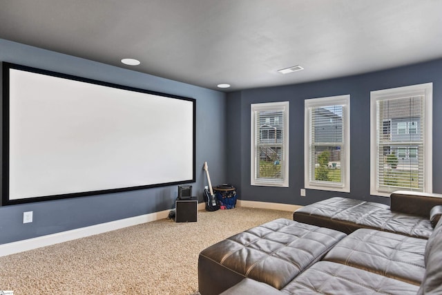 carpeted cinema with baseboards