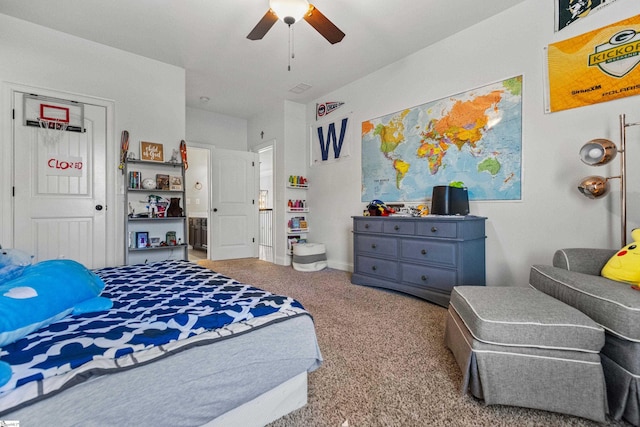 carpeted bedroom featuring a ceiling fan