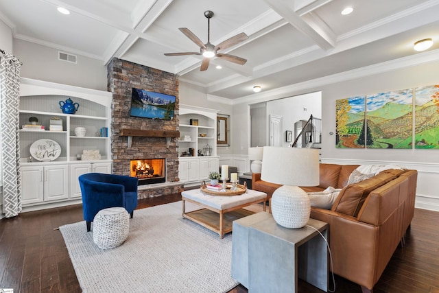 living room featuring coffered ceiling, a ceiling fan, dark wood-type flooring, and visible vents