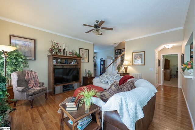 38 River Park Ln, Taylors, SC 29687 - living area with crown molding, wood finished floors, a ceiling fan, and stairs