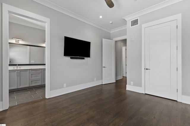 110 N Markley St Unit 304, Greenville, SC 29601 - unfurnished bedroom featuring visible vents, dark wood-type flooring, crown molding, baseboards, and ensuite bathroom