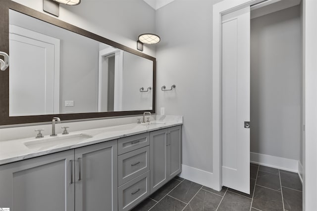 110 N Markley St Unit 304, Greenville, SC 29601 - full bathroom featuring baseboards, tile patterned flooring, a sink, and double vanity