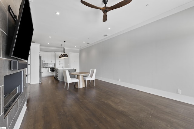 110 N Markley St Unit 304, Greenville, SC 29601 - dining area featuring recessed lighting, dark wood finished floors, visible vents, a ceiling fan, and ornamental molding