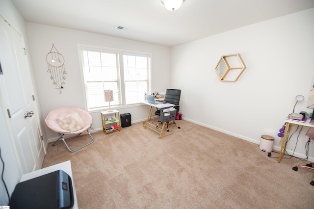 home office with carpet floors, visible vents, and baseboards