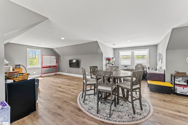 1359 Martin Creek Rd, Seneca, SC 29678 - dining room with plenty of natural light, baseboards, lofted ceiling, and light wood-style flooring