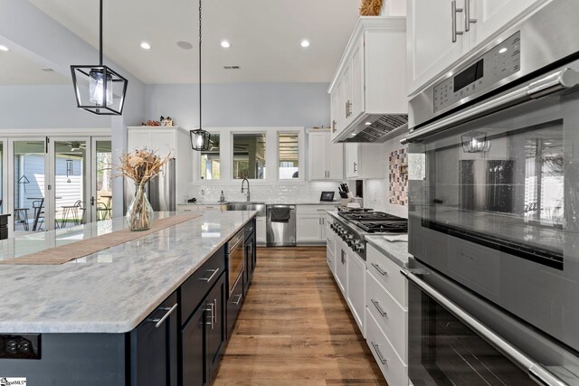 1359 Martin Creek Rd, Seneca, SC 29678 - kitchen with white cabinetry, tasteful backsplash, stainless steel appliances, and recessed lighting