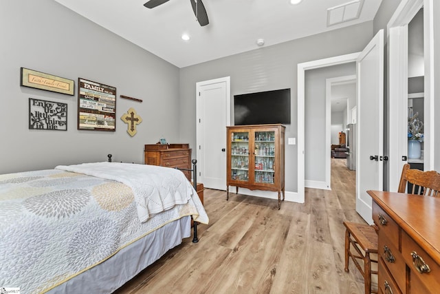 1359 Martin Creek Rd, Seneca, SC 29678 - bedroom with light wood-style floors, freestanding refrigerator, baseboards, visible vents, and recessed lighting