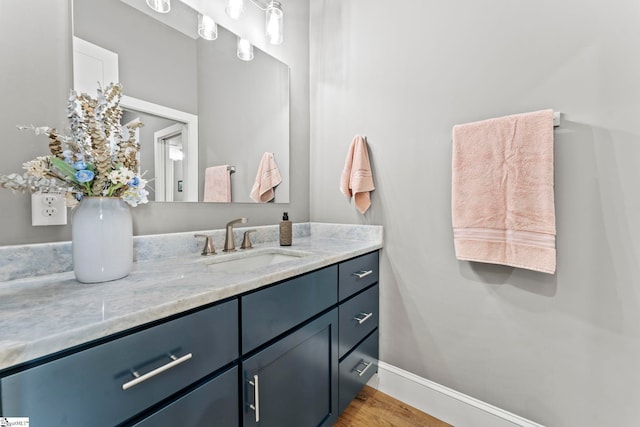 1359 Martin Creek Rd, Seneca, SC 29678 - bathroom with baseboards, wood finished floors, and vanity