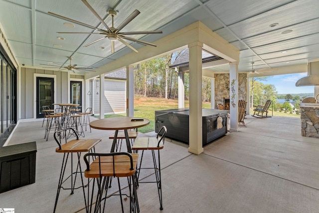 1359 Martin Creek Rd, Seneca, SC 29678 - view of patio featuring ceiling fan, outdoor dining area, and a hot tub