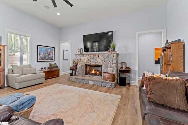 1359 Martin Creek Rd, Seneca, SC 29678 - living area with a fireplace, wood finished floors, baseboards, and ceiling fan