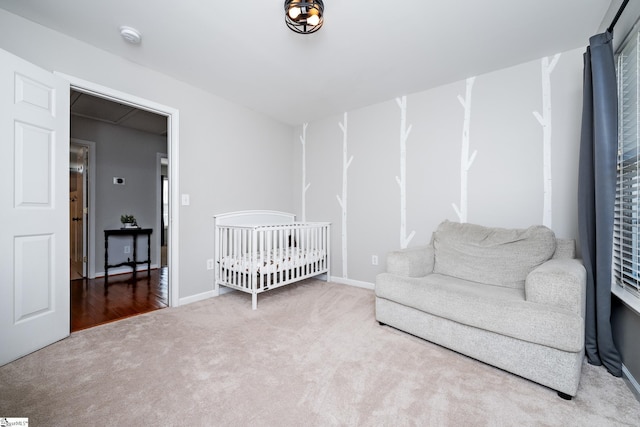 carpeted bedroom with baseboards