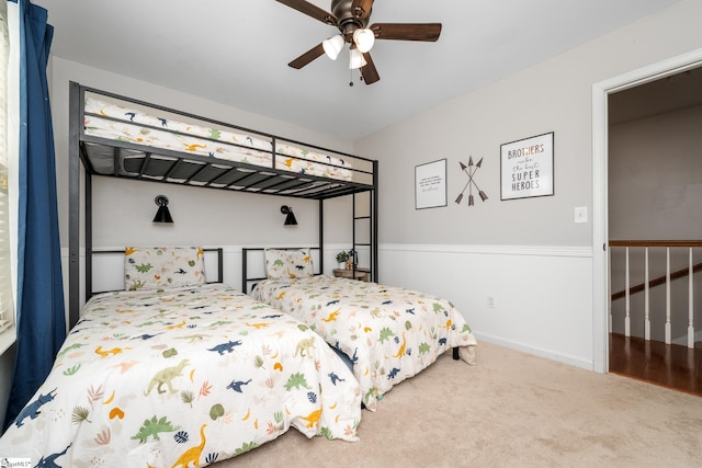 bedroom with carpet and a ceiling fan