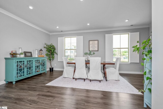 dining room with plenty of natural light, baseboards, recessed lighting, and ornamental molding