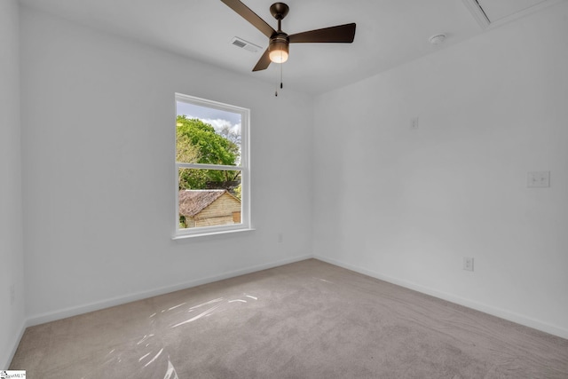 empty room with ceiling fan, baseboards, visible vents, and carpet flooring