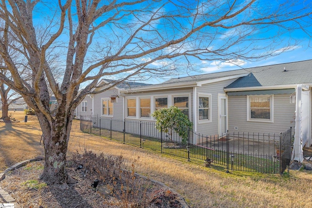 view of home's exterior with a fenced backyard