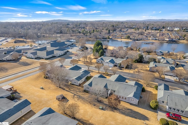 bird's eye view with a water view and a residential view