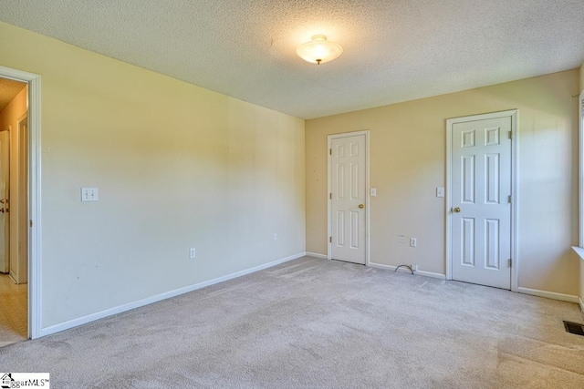 125 N River Hills Dr, Spartanburg, SC 29303 - carpeted empty room with baseboards and a textured ceiling