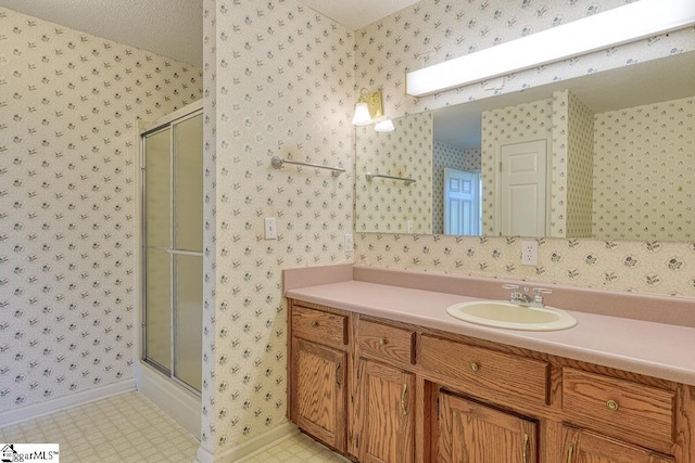 125 N River Hills Dr, Spartanburg, SC 29303 - full bath with wallpapered walls, vanity, and a stall shower