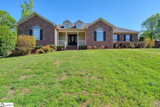 125 N River Hills Dr, Spartanburg, SC 29303 - view of front of home with brick siding, a front yard, and covered porch