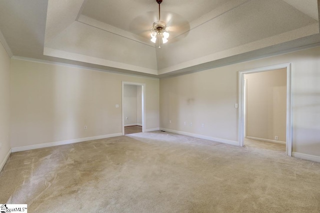 125 N River Hills Dr, Spartanburg, SC 29303 - unfurnished room with light colored carpet, ceiling fan, baseboards, and a tray ceiling