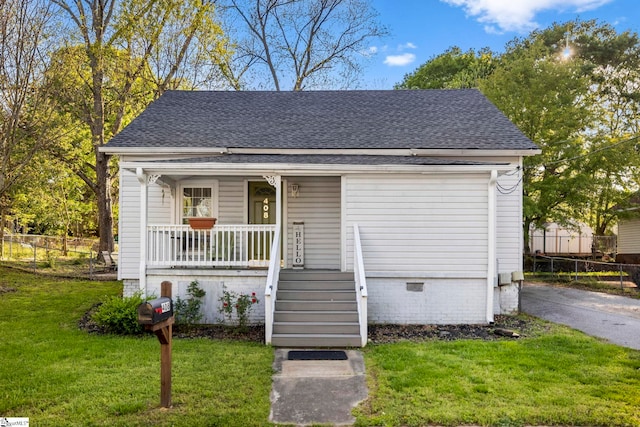 408 S 2nd St, Easley, SC 29640 - bungalow-style home featuring crawl space, covered porch, fence, a front yard, and roof with shingles