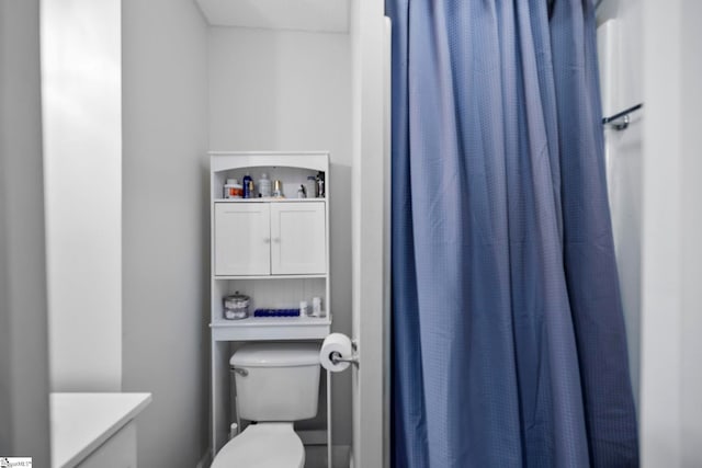 408 S 2nd St, Easley, SC 29640 - bathroom with vanity, curtained shower, and toilet