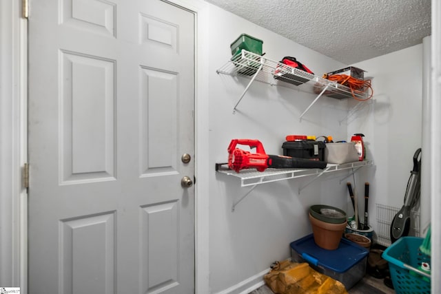 408 S 2nd St, Easley, SC 29640 - laundry area featuring baseboards and a textured ceiling