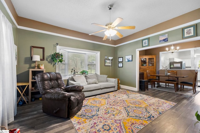 408 S 2nd St, Easley, SC 29640 - living area featuring baseboards, wood finished floors, a textured ceiling, and ceiling fan