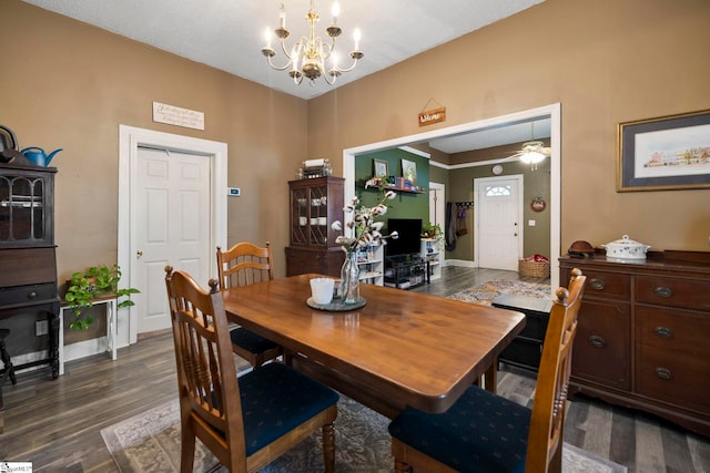 408 S 2nd St, Easley, SC 29640 - dining room featuring dark wood finished floors, baseboards, and ceiling fan with notable chandelier