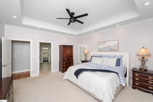 127 Warren Dr, Easley, SC 29640 - bedroom with recessed lighting, a tray ceiling, ornamental molding, carpet flooring, and ceiling fan