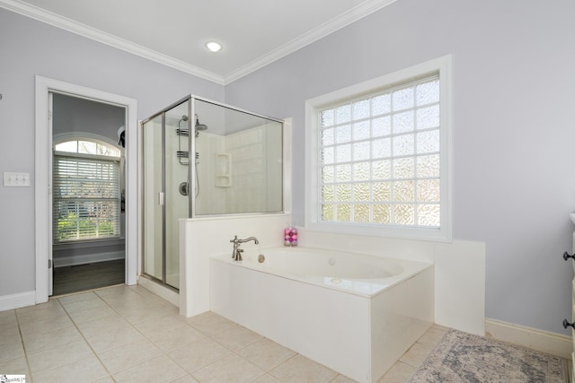 127 Warren Dr, Easley, SC 29640 - full bath featuring a bath, tile patterned floors, baseboards, a shower stall, and ornamental molding