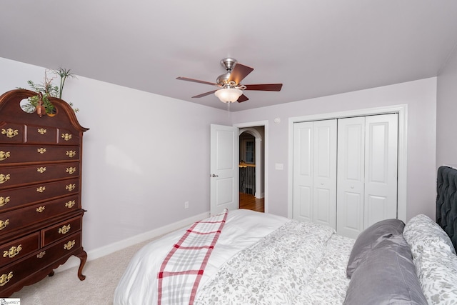 127 Warren Dr, Easley, SC 29640 - bedroom featuring light colored carpet, ceiling fan, baseboards, and a closet