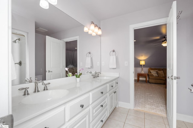 127 Warren Dr, Easley, SC 29640 - ensuite bathroom with a ceiling fan, tile patterned floors, a sink, and double vanity