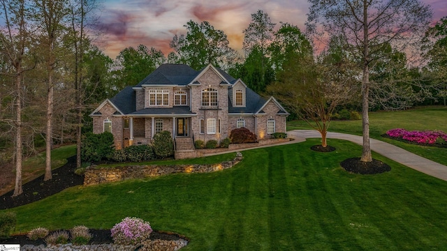 127 Warren Dr, Easley, SC 29640 - traditional-style home featuring brick siding, a yard, and concrete driveway