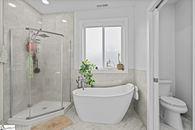 308 Pineridge Dr, Spartanburg, SC 29303 - full bathroom featuring a freestanding tub, toilet, visible vents, and a stall shower