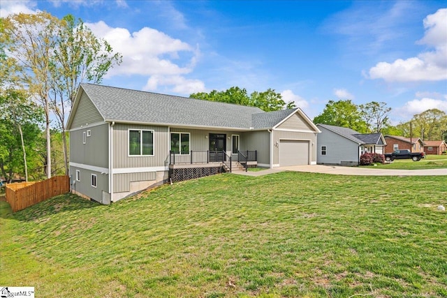 308 Pineridge Dr, Spartanburg, SC 29303 - single story home with a front lawn, driveway, a porch, fence, and an attached garage