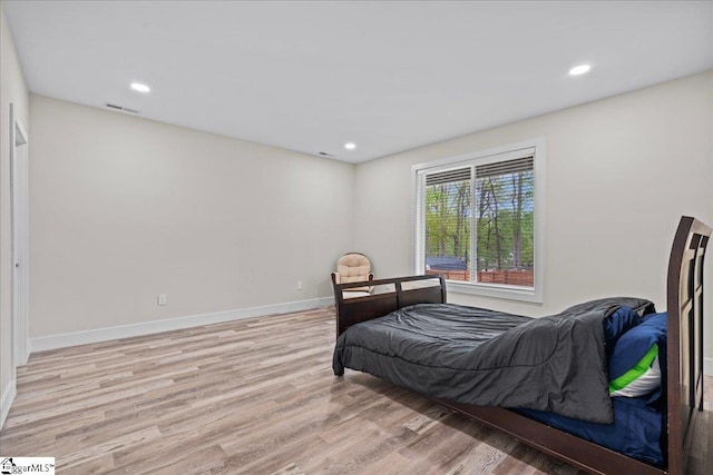 308 Pineridge Dr, Spartanburg, SC 29303 - bedroom with baseboards, light wood finished floors, visible vents, and recessed lighting