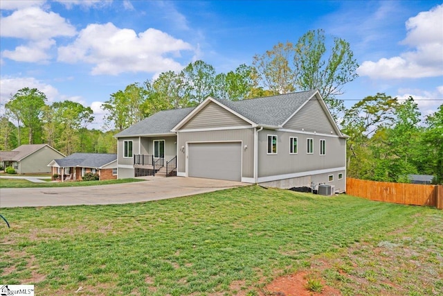 308 Pineridge Dr, Spartanburg, SC 29303 - ranch-style house featuring fence, central AC, driveway, a front yard, and a garage