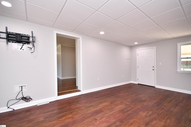 105 Ridgeland Cir, Easley, SC 29640 - unfurnished room featuring a paneled ceiling, baseboards, and dark wood finished floors