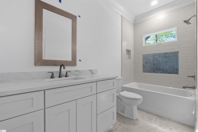 full bathroom featuring marble finish floor, toilet, vanity, and tub / shower combination