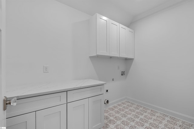 clothes washing area with cabinet space, washer hookup, baseboards, and electric dryer hookup
