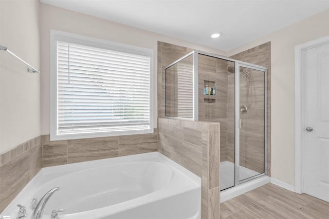 204 Lambert Ct, Simpsonville, SC 29680 - full bathroom with a shower stall, a garden tub, and recessed lighting
